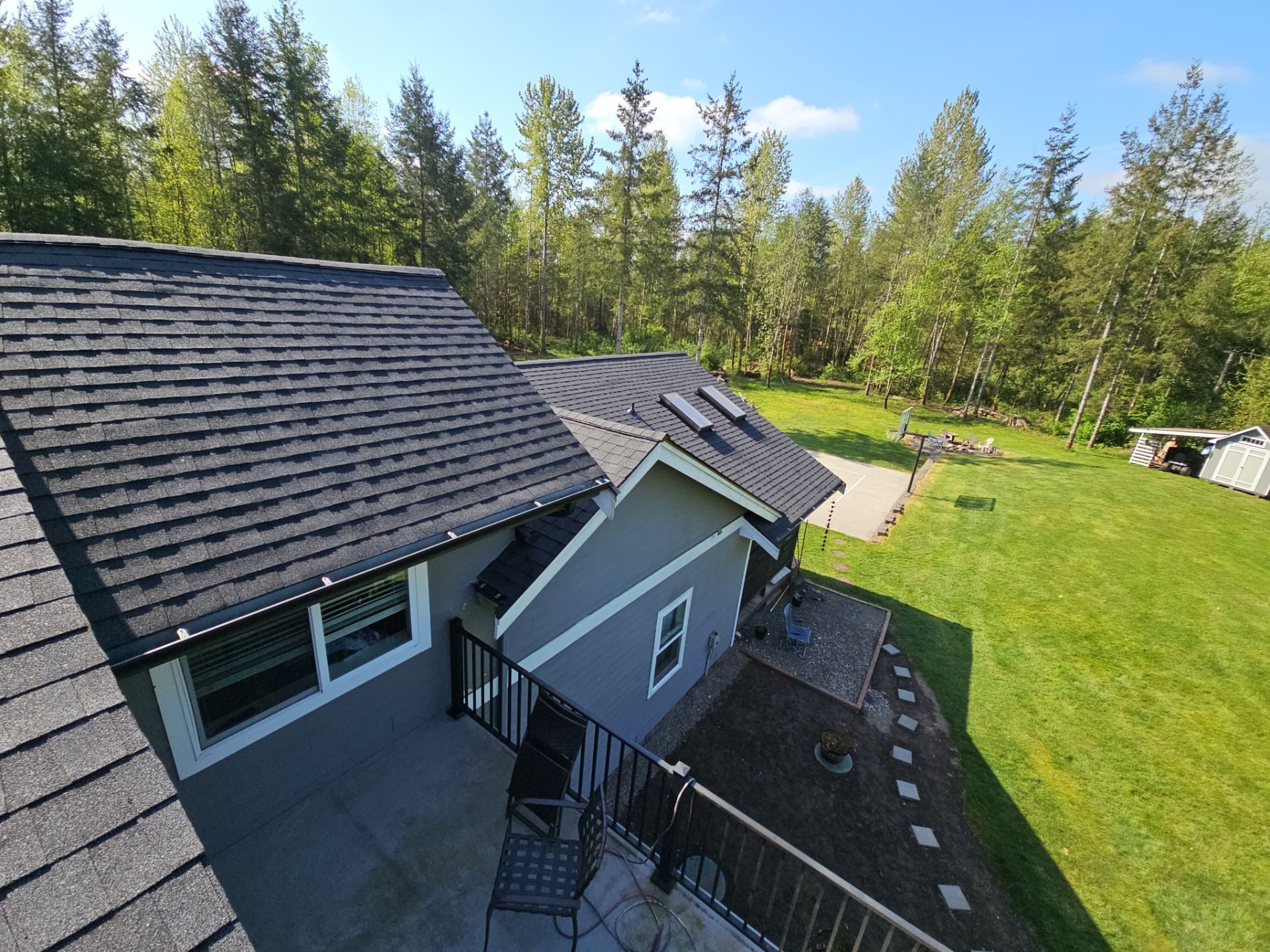Charcoal asphalt shingle roof line and edge detail in Lake Stevens, WA