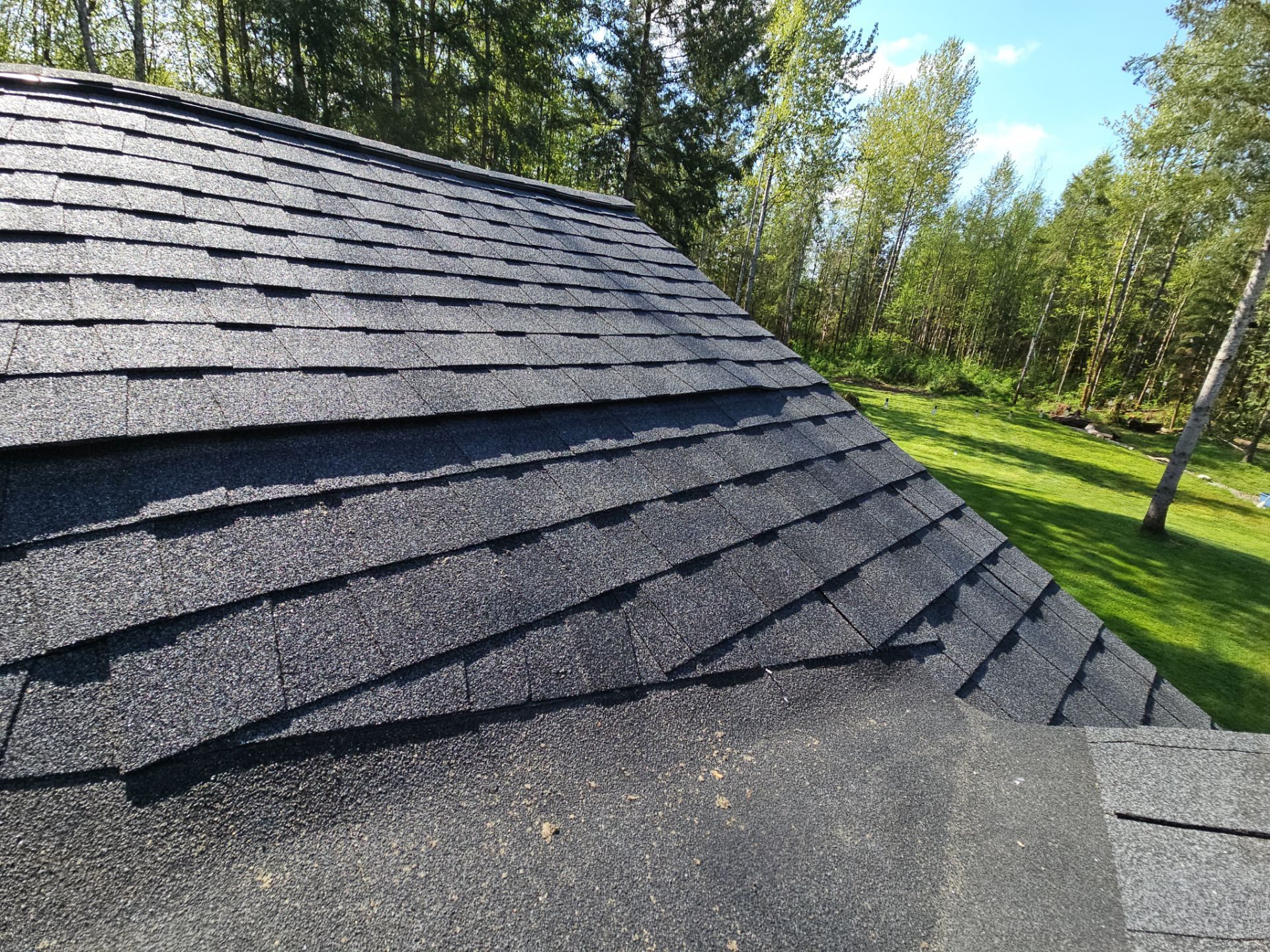 Wide angle of completed Charcoal asphalt shingle roof in Lake Stevens, WA