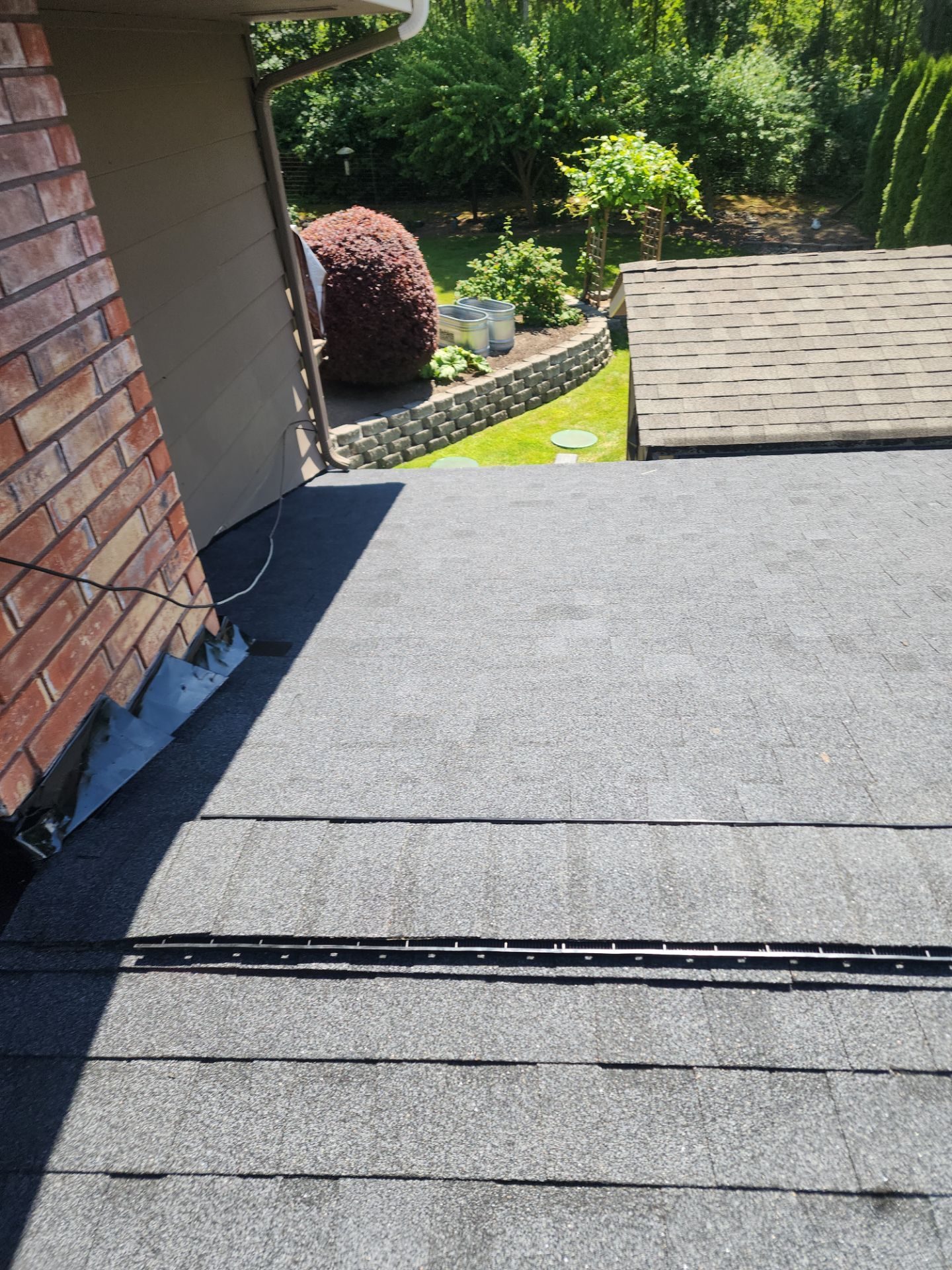 Roof plane detail showing Heather Grey asphalt shingle pattern in Lake Stevens, WA