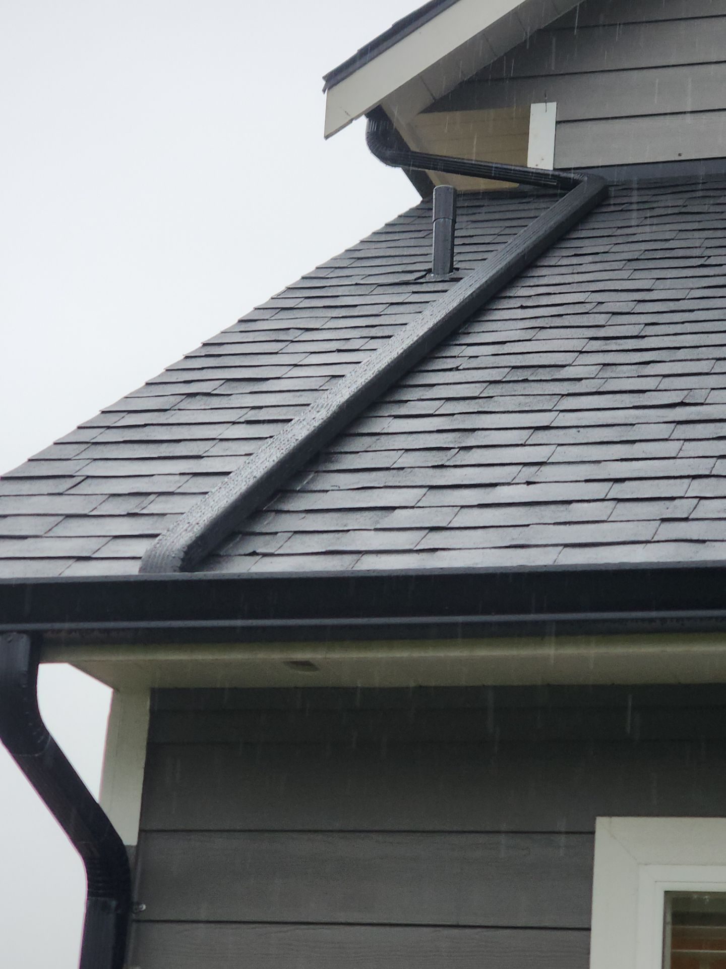Detail of Midnight Black asphalt shingle roof showing craftsmanship in Snohomish, WA