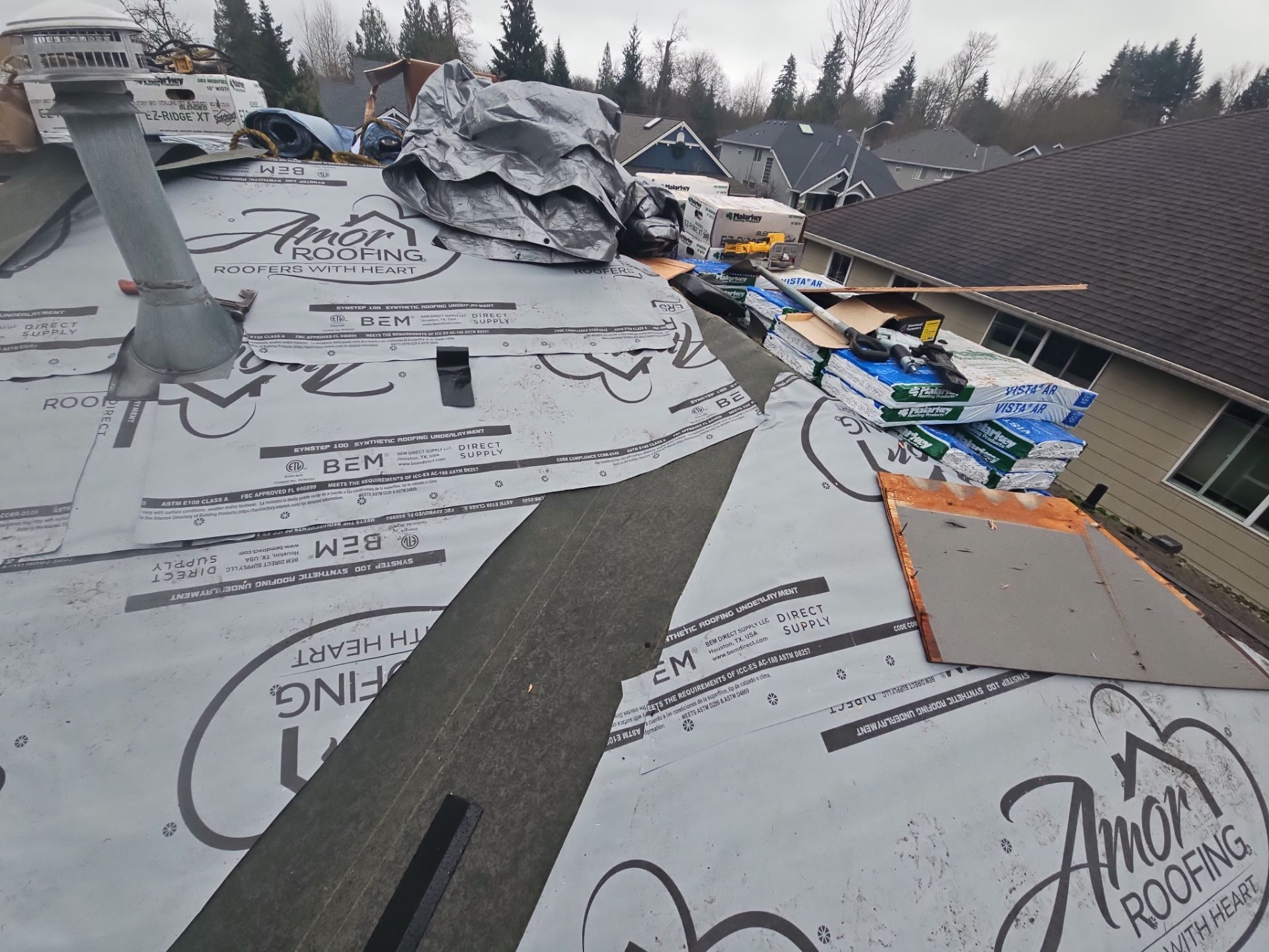 Mid-installation view during Storm Grey asphalt shingle roof project in Lake Stevens, WA