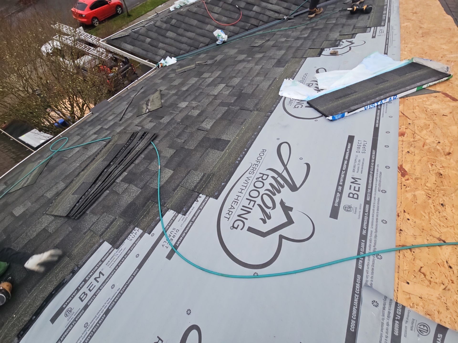 Tear-off and substrate exposure during Storm Grey asphalt shingle install in Lake Stevens, WA