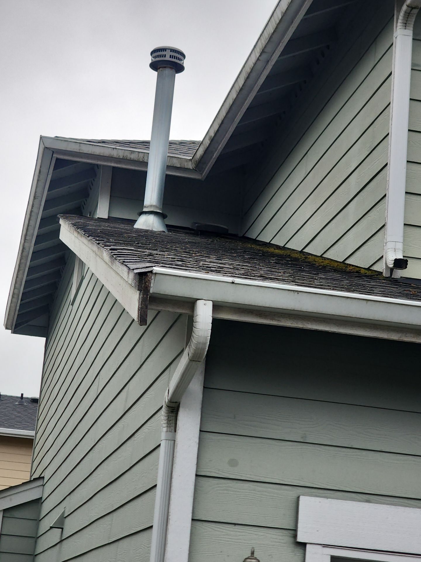 Detail of Storm Grey asphalt shingle roof showing craftsmanship in Mill Creek, WA