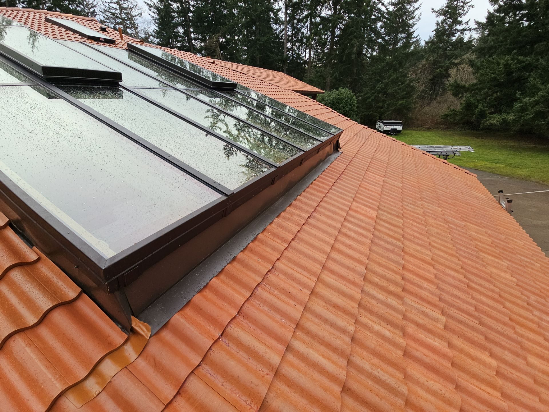 Antique Clay Brava Spanish barrel tile roof installation by Amor Roofing in Camano Island, WA