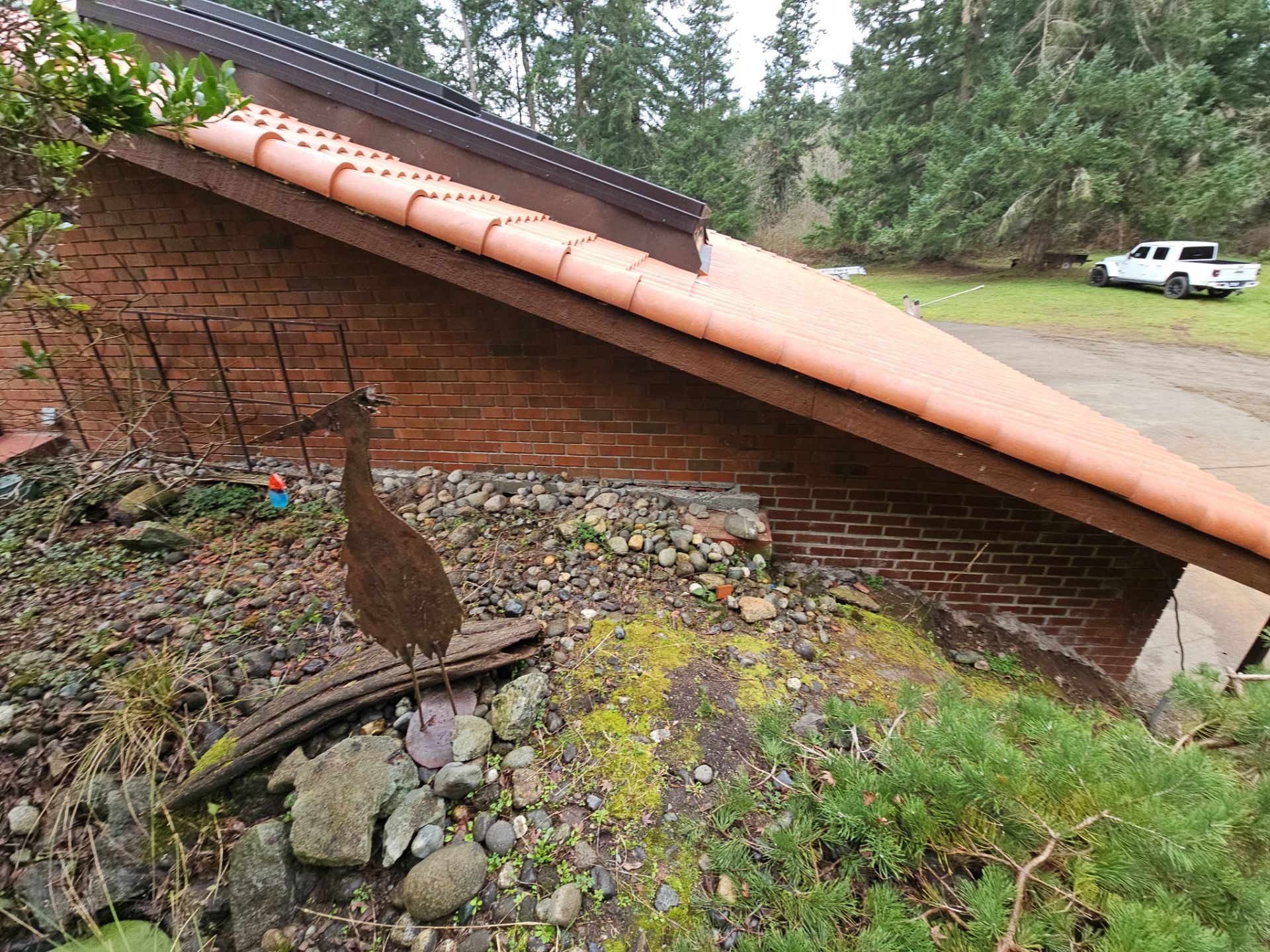 Wide angle of completed Antique Clay Brava Spanish barrel tile roof in Camano Island, WA