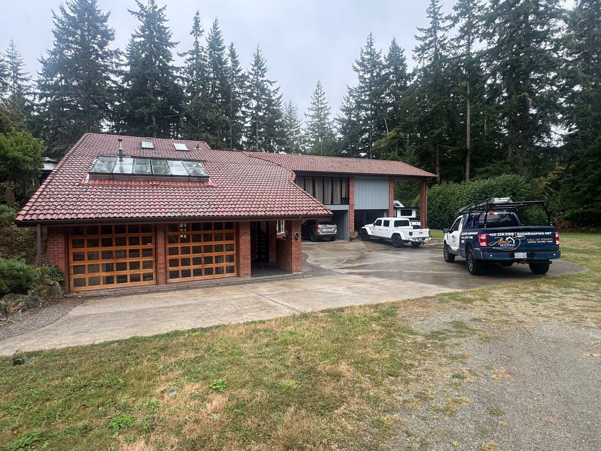 Roof plane detail showing Antique Clay Brava Spanish barrel tile pattern in Camano Island, WA