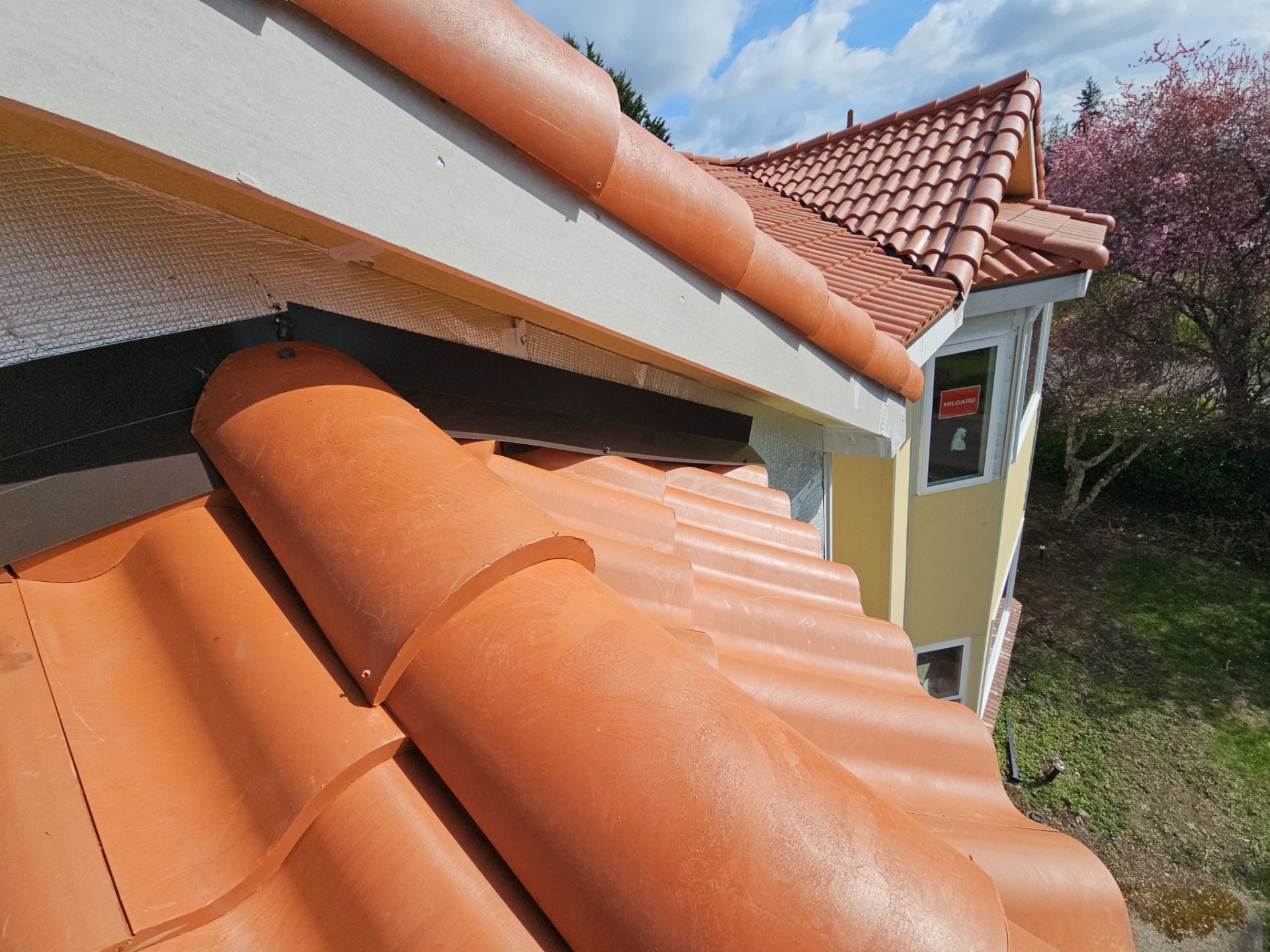 Detail of Antique Clay Brava Spanish barrel tile roof showing craftsmanship in Mukilteo, WA