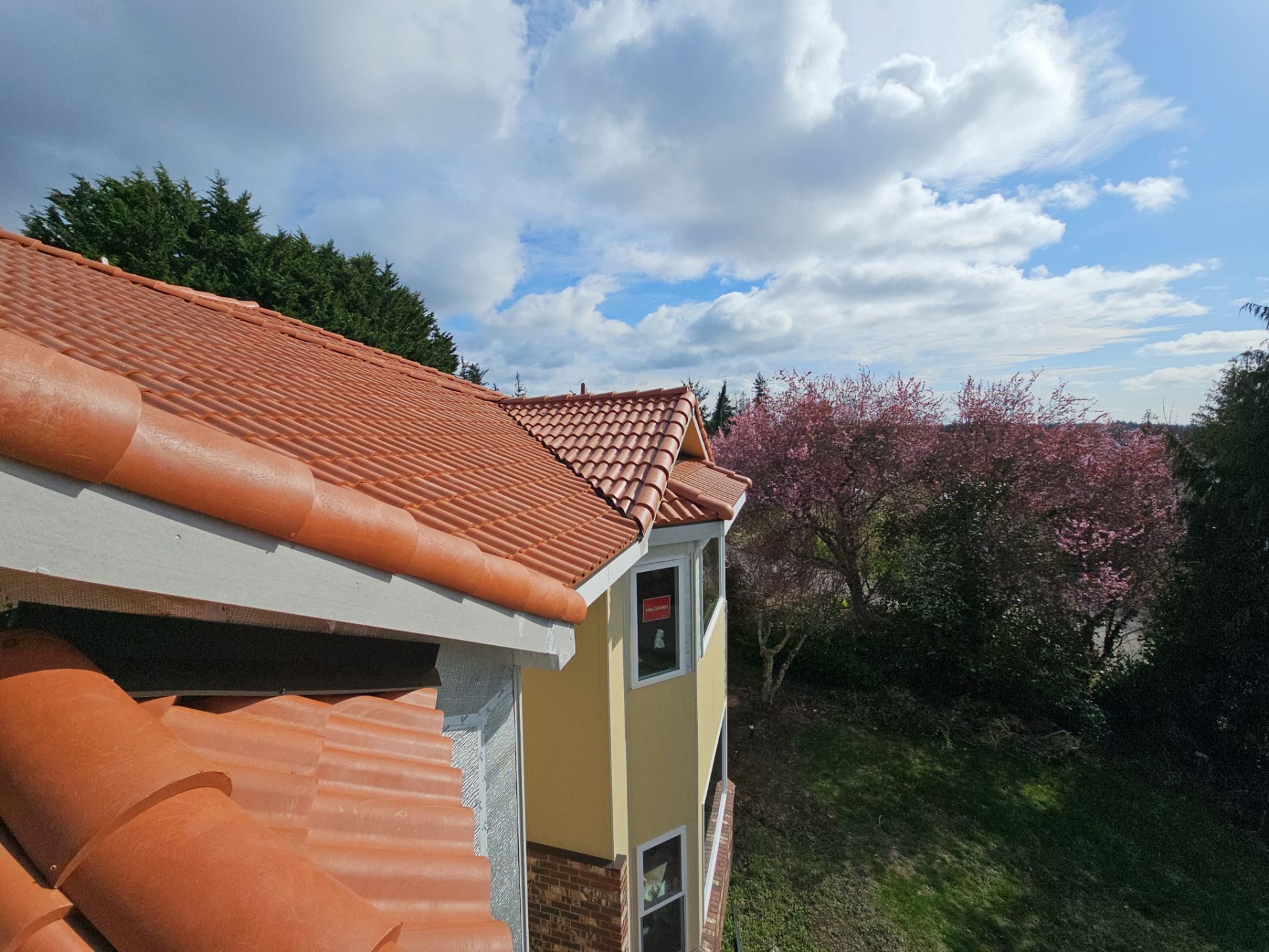Close-up of Antique Clay Brava Spanish barrel tile roof finish in Mukilteo, WA