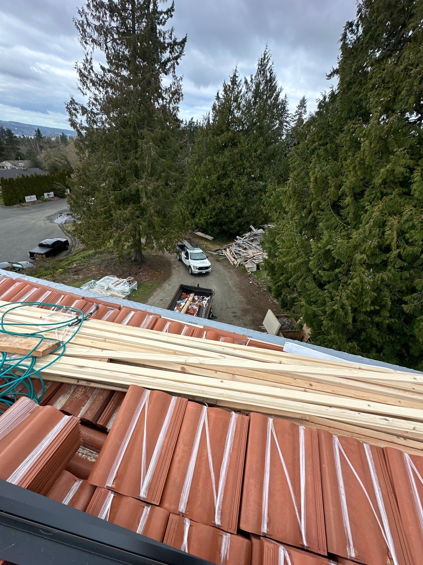 Wide angle of completed Antique Clay Brava Spanish barrel tile roof in Mukilteo, WA