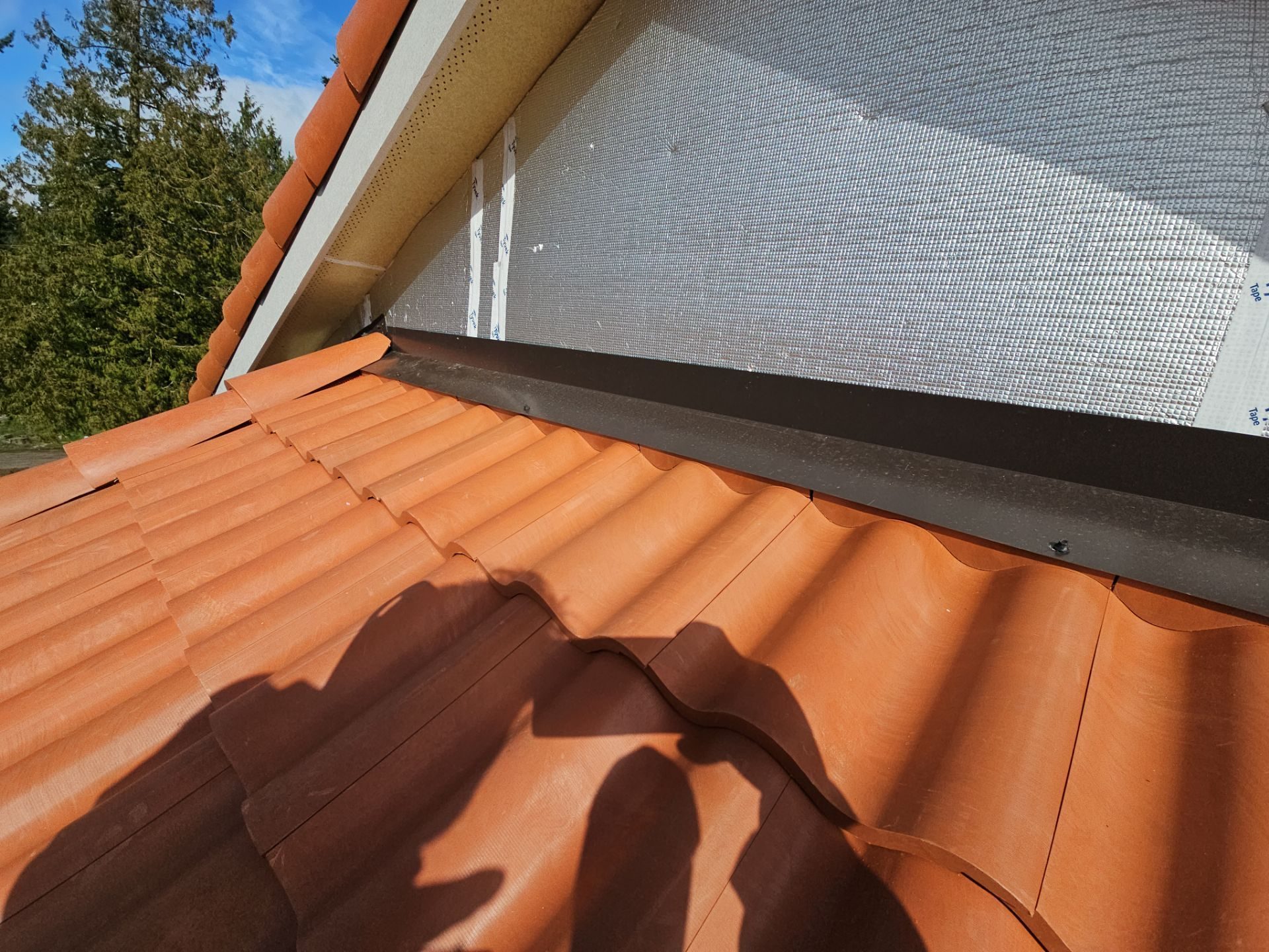 Aerial drone view of completed Antique Clay Brava Spanish barrel tile roof on Mukilteo, WA home by Amor Roofing