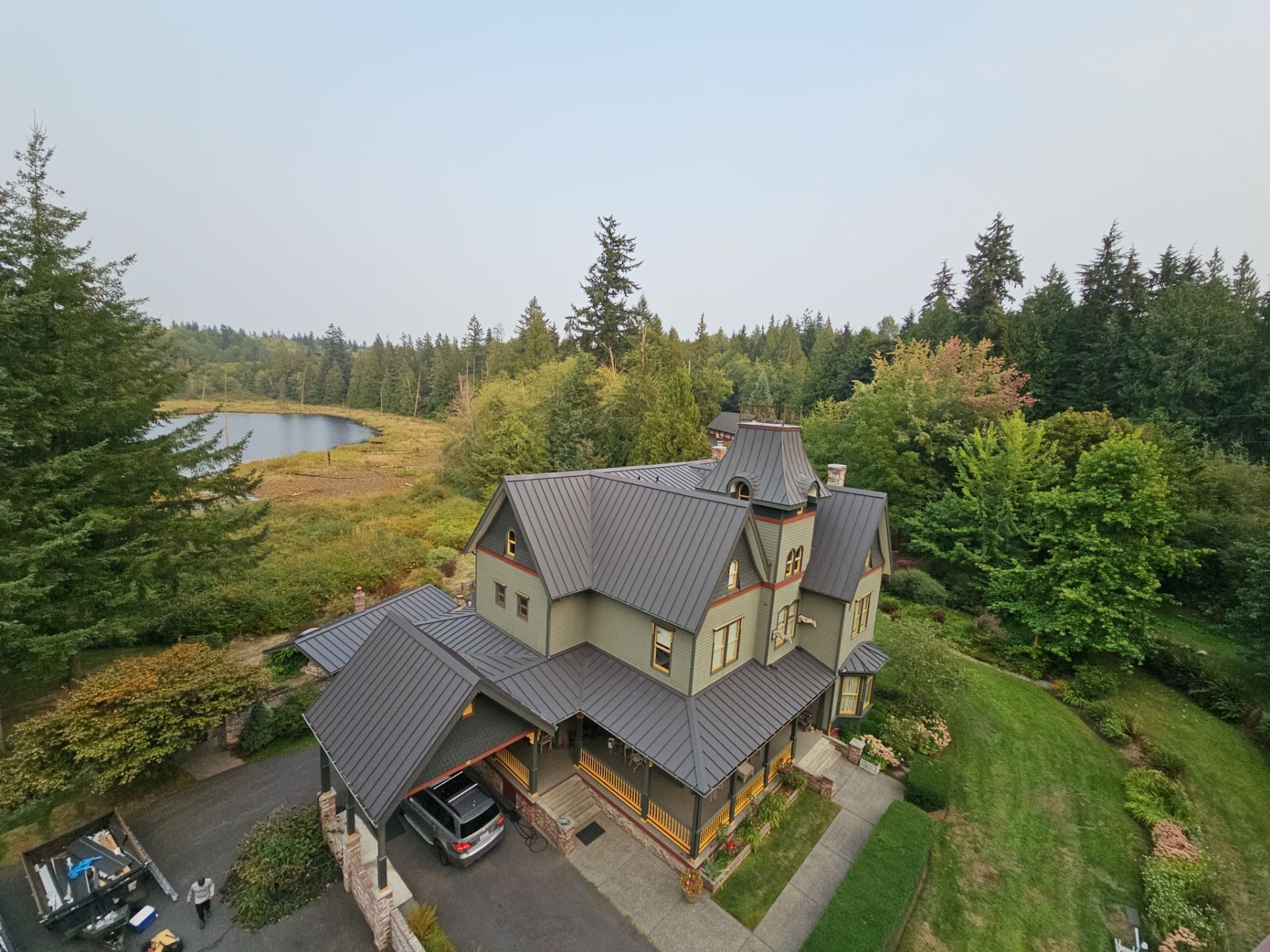 Black Carbon standing seam metal roof transition and flashing detail in Stanwood, WA
