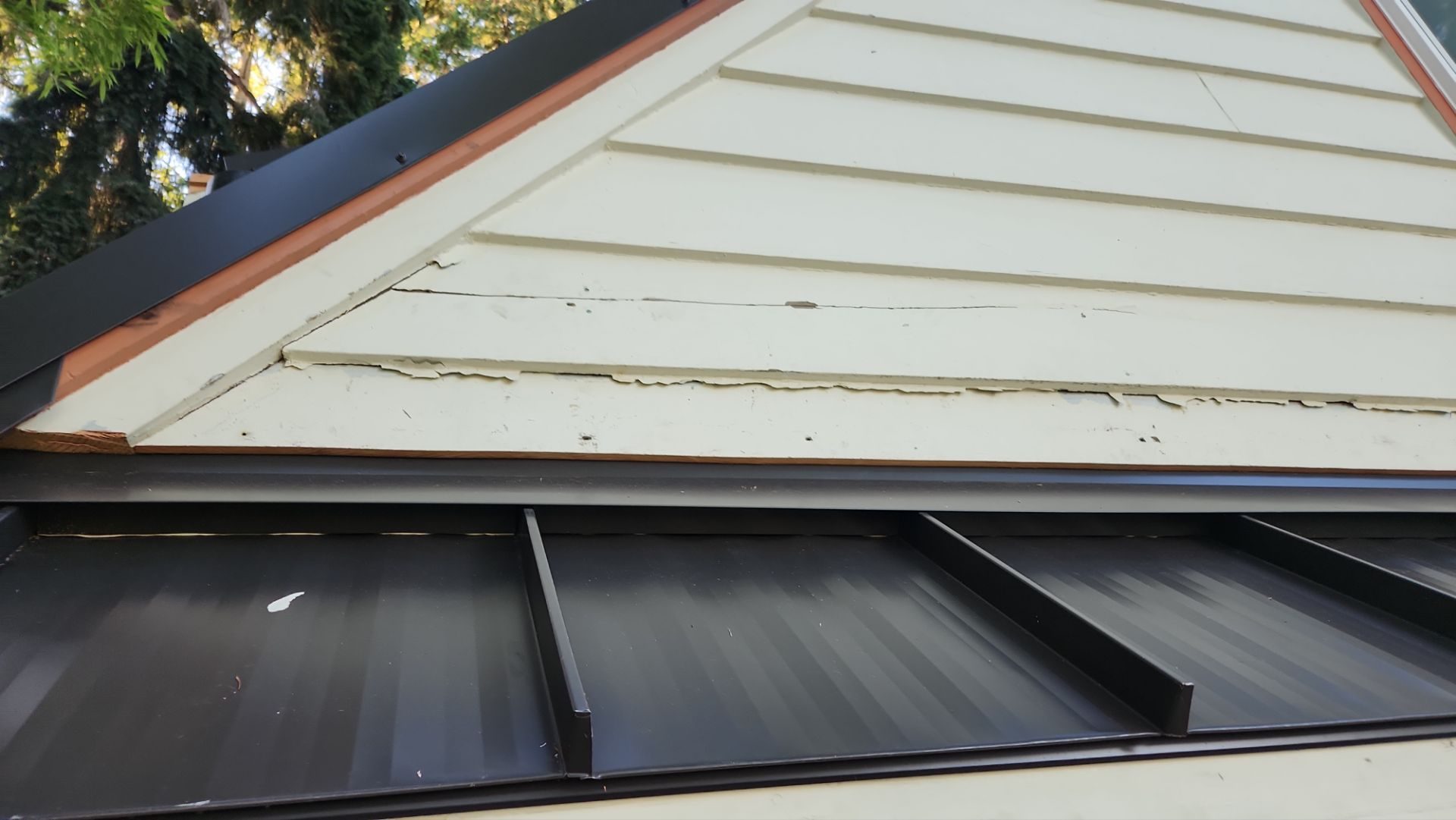 Medium Bronze standing seam metal roof installation by Amor Roofing in Bellevue, WA