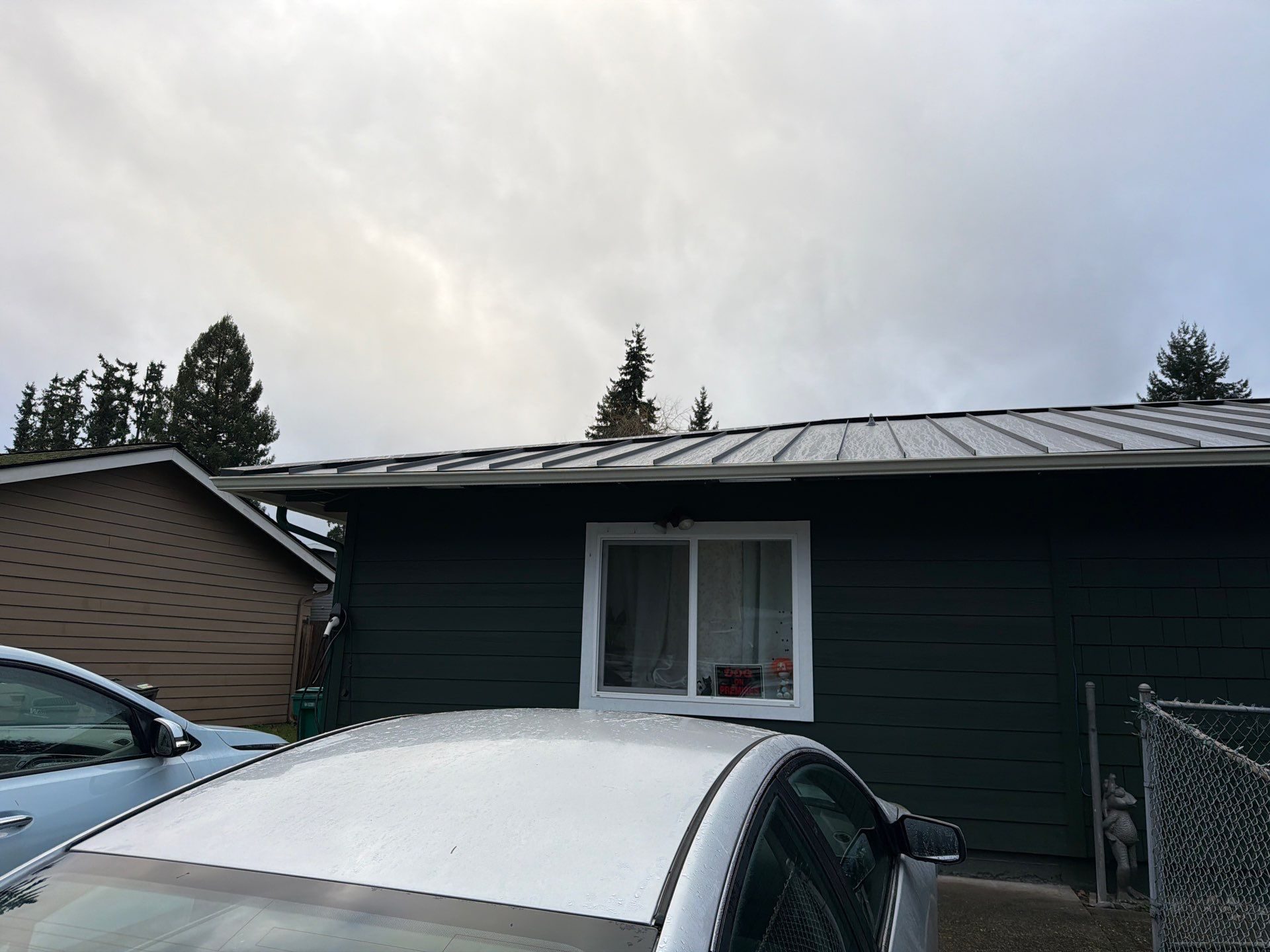 Cascade Gray standing seam metal roof installation by Amor Roofing in Woodinville, WA