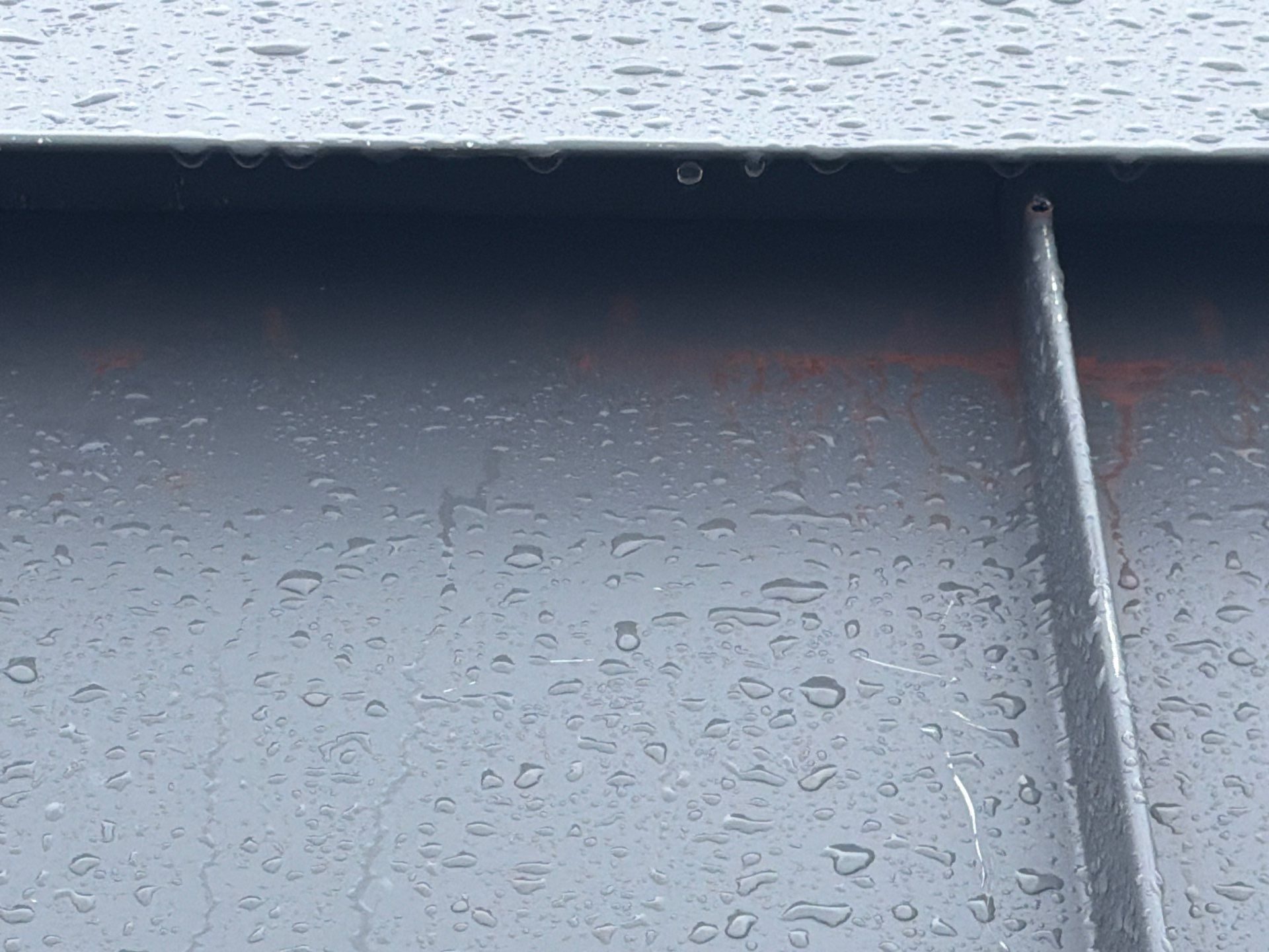 Wide angle of completed Cascade Gray standing seam metal roof in Woodinville, WA