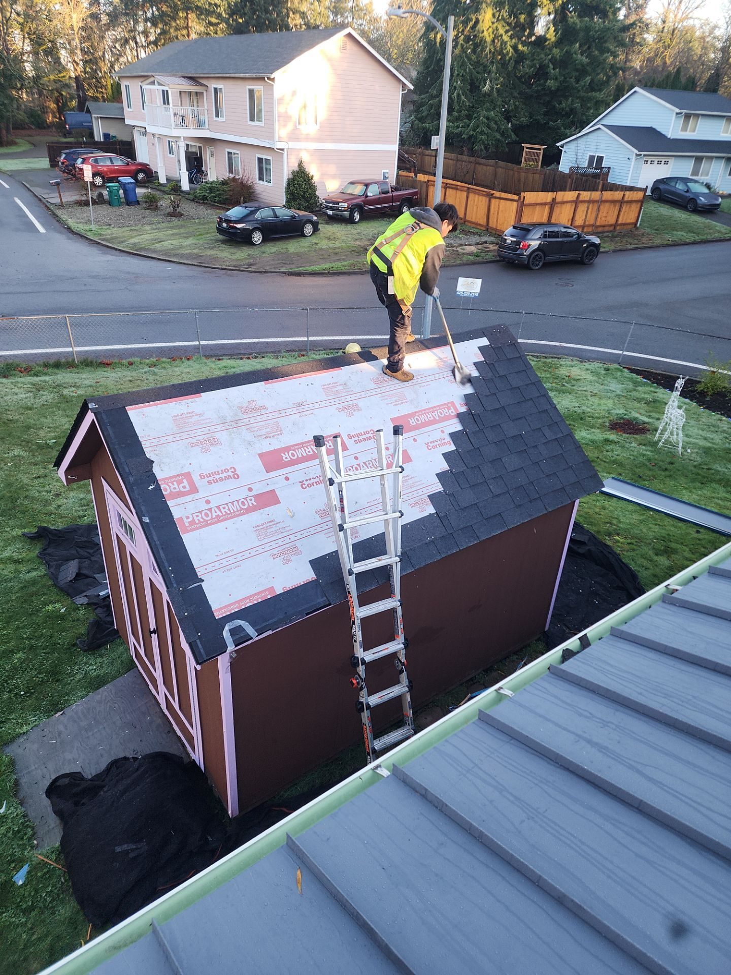 Mid-installation view during Cascade Gray standing seam metal roof project in Woodinville, WA