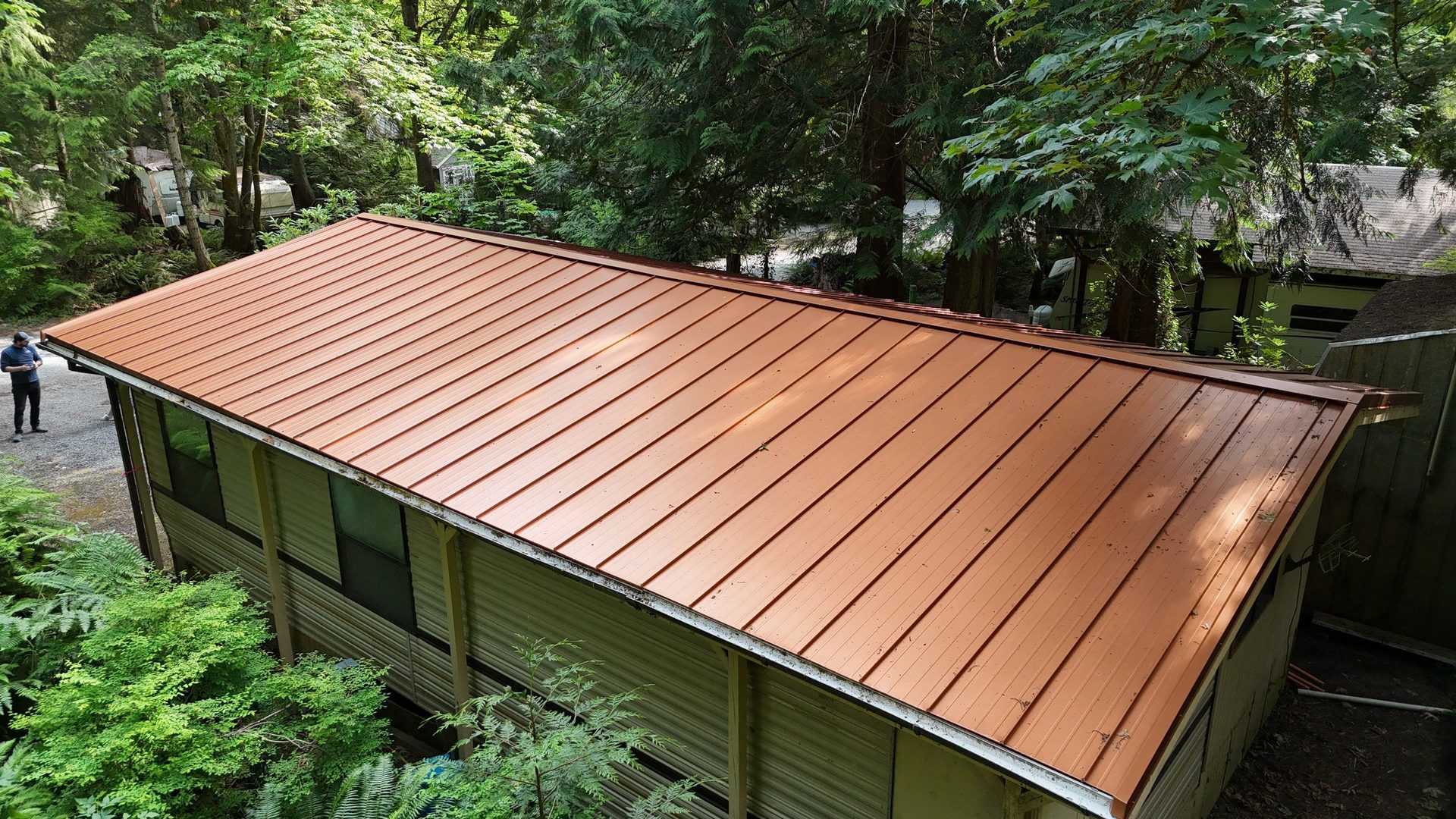 Detail of Copper Penny standing seam metal roof showing craftsmanship in Marysville, WA