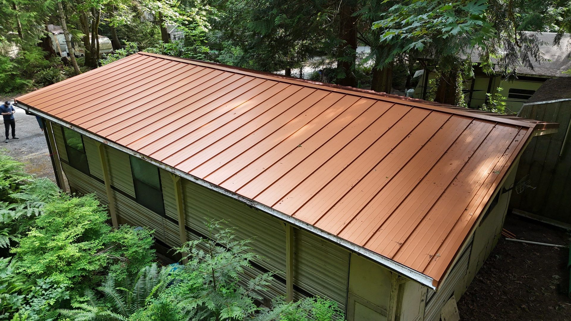 Copper Penny standing seam metal roof installation by Amor Roofing in Marysville, WA