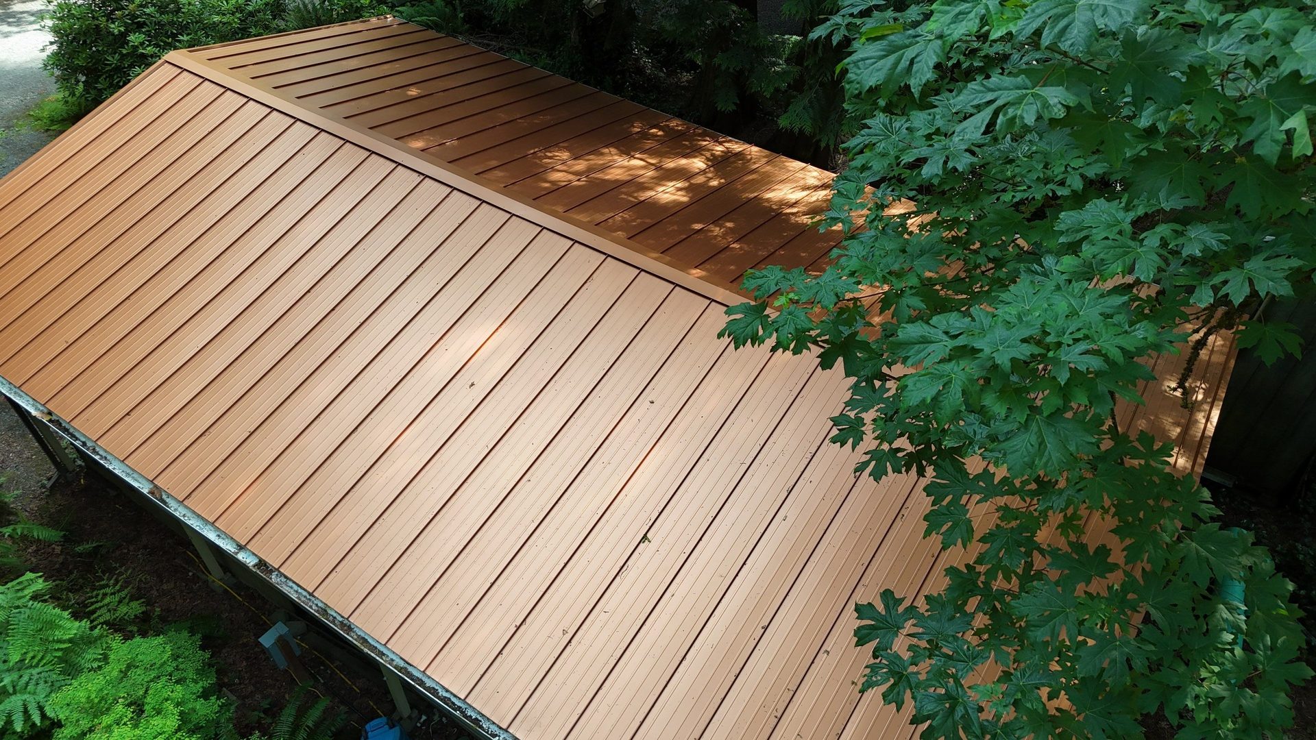 Wide angle of completed Copper Penny standing seam metal roof in Marysville, WA
