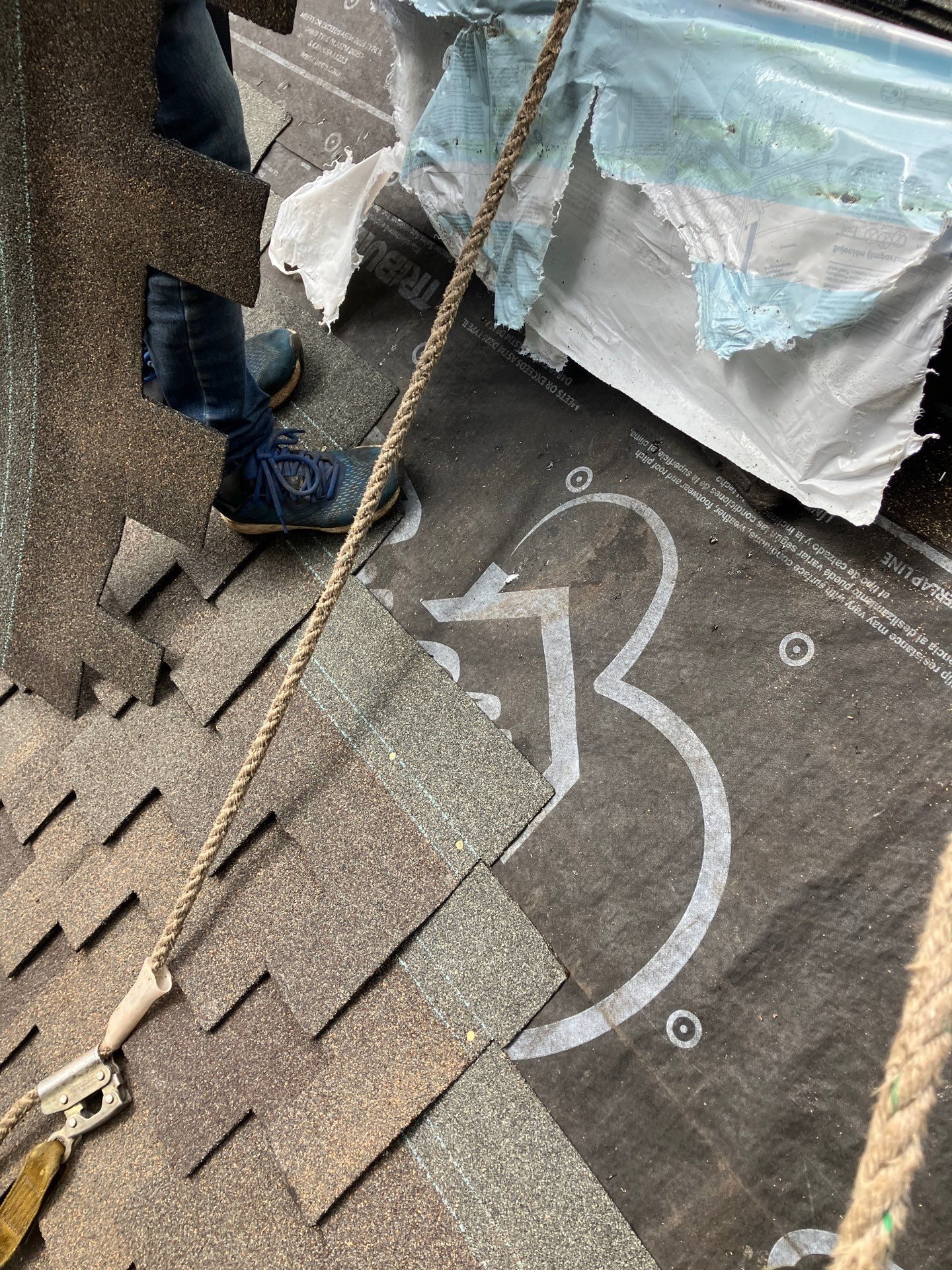 Mid-installation view during Autumn Blend CertainTeed Presidential asphalt shingle roof project in Mill Creek, WA