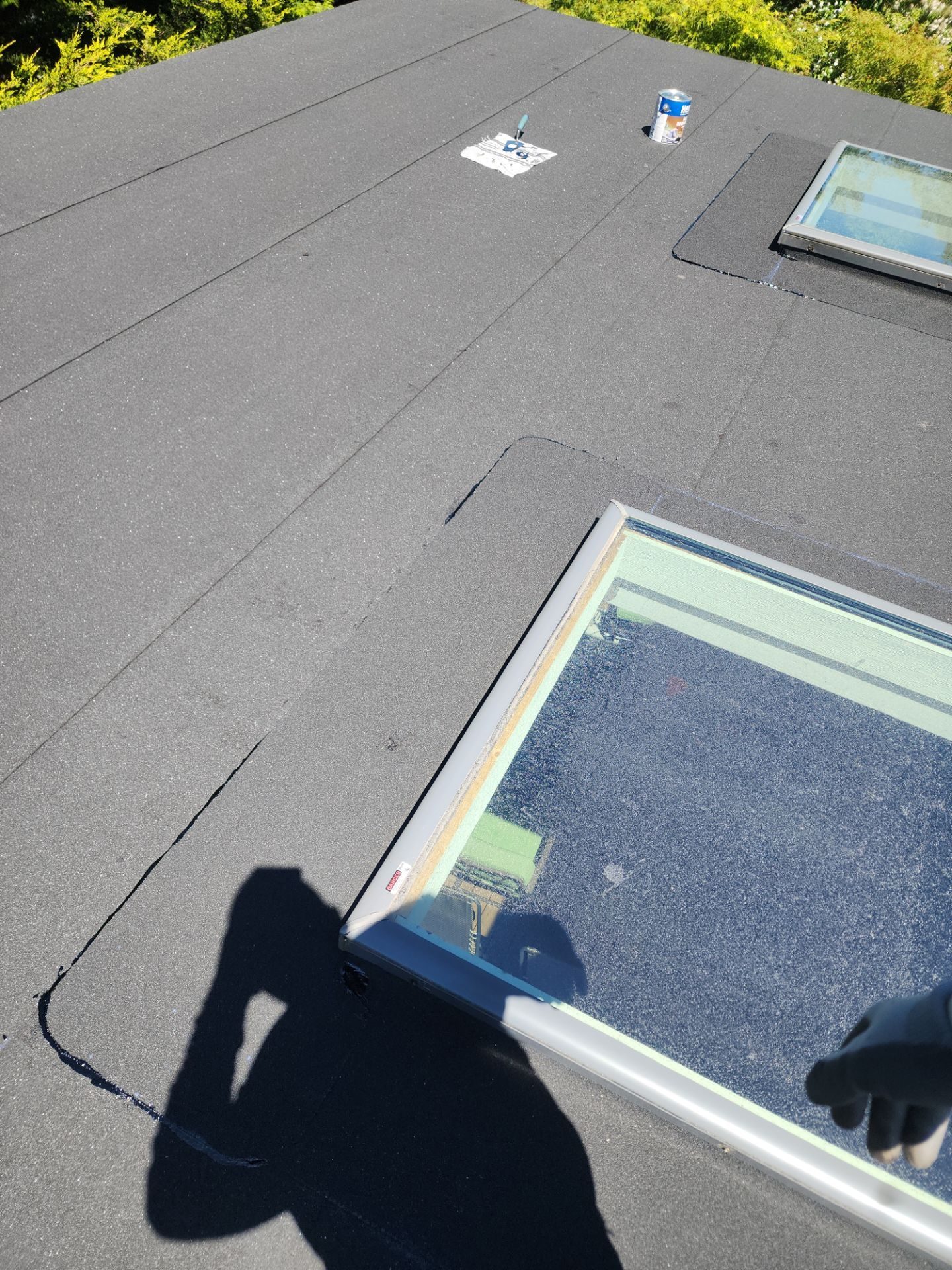 Wide angle of completed Midnight Black CertainTeed Presidential asphalt shingle roof in Brier, WA