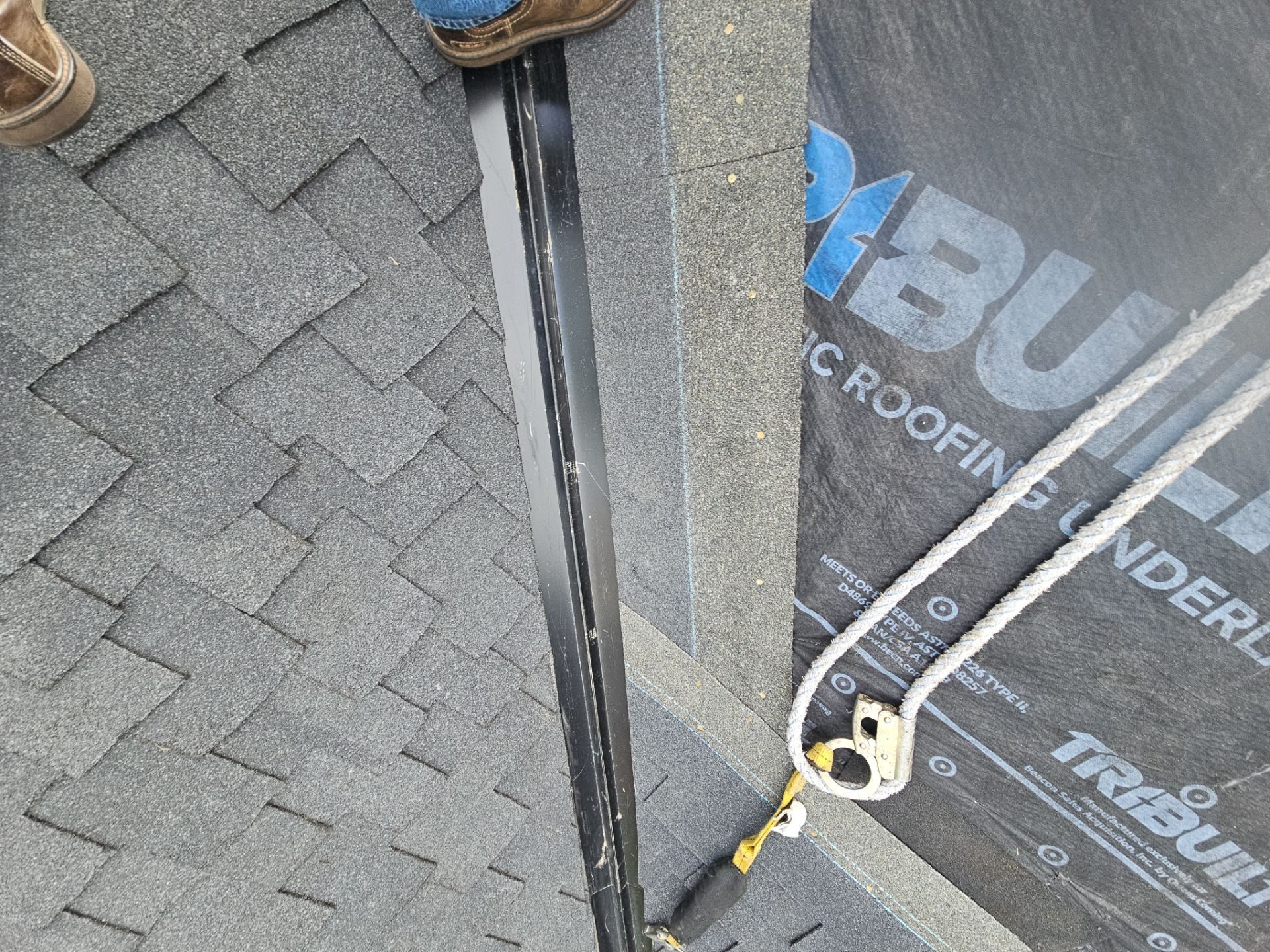Wide angle of completed Charcoal CertainTeed Presidential Shake asphalt shingle roof in Seattle, WA