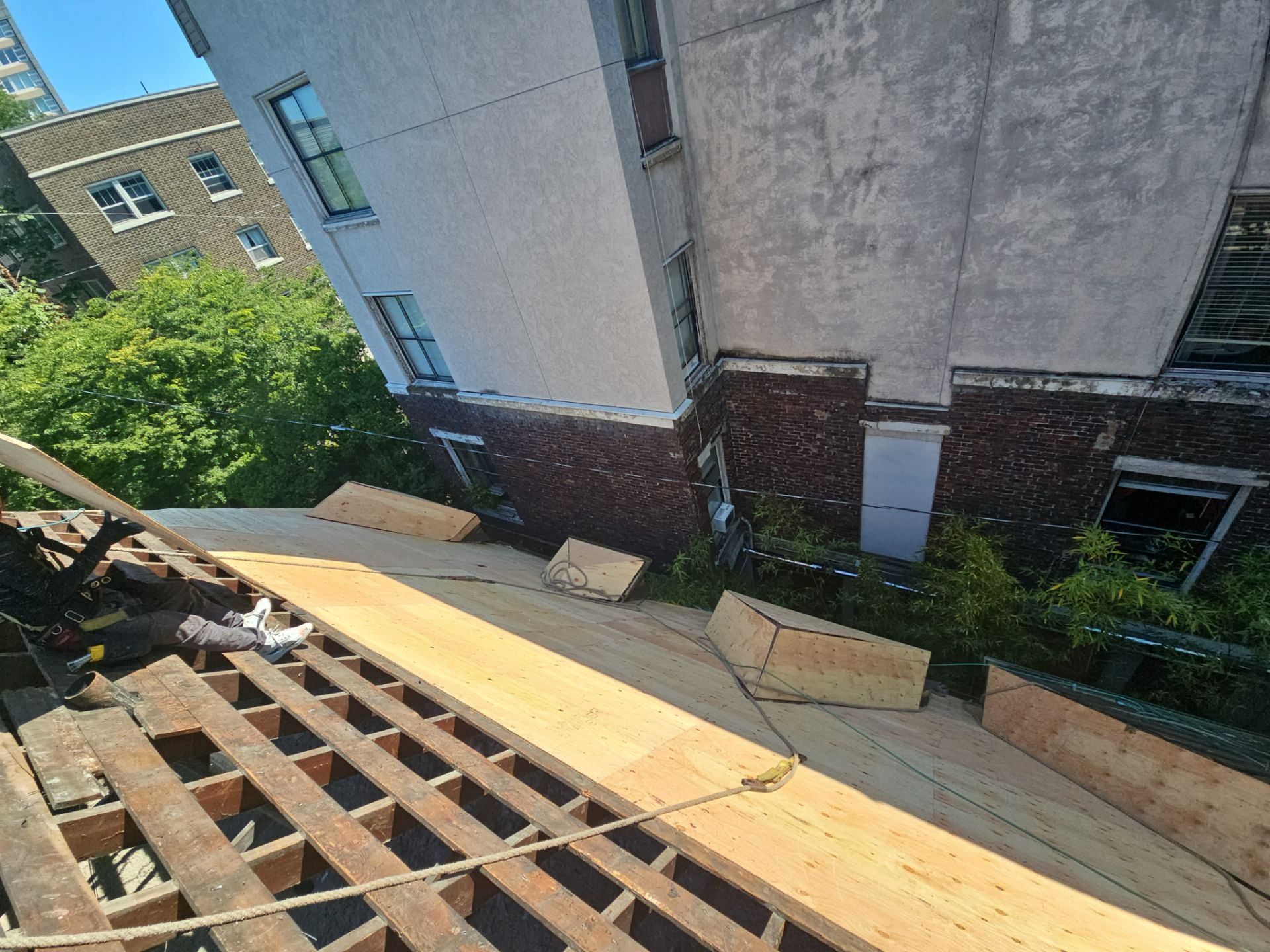 Mid-installation view during Charcoal CertainTeed Presidential Shake asphalt shingle roof project in Seattle, WA