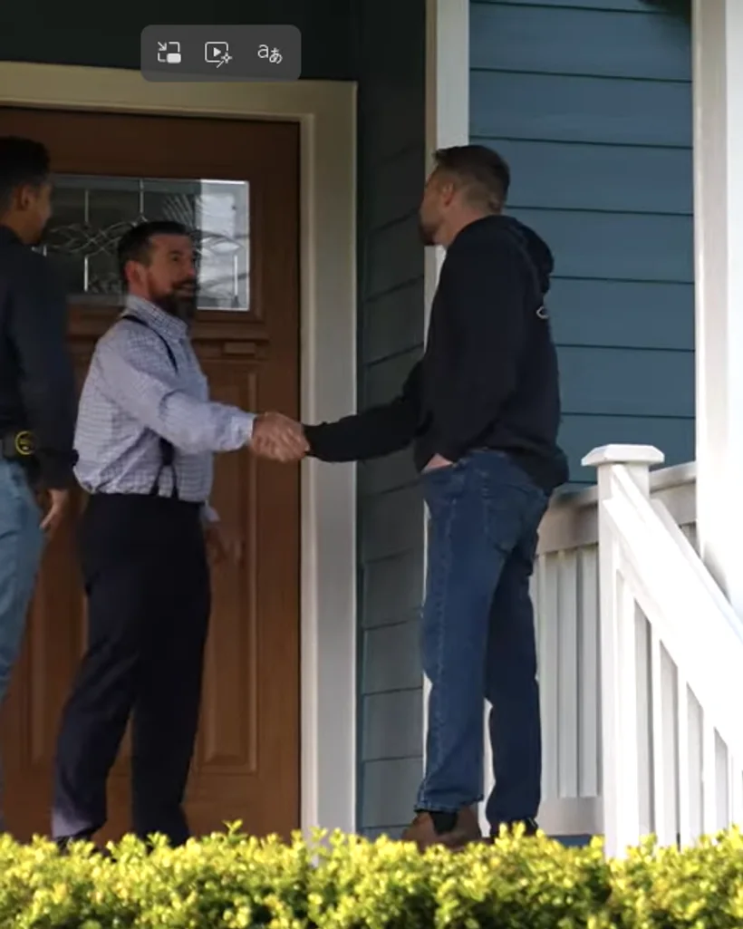 Amor Roofing project consultant greeting a customer at their front door