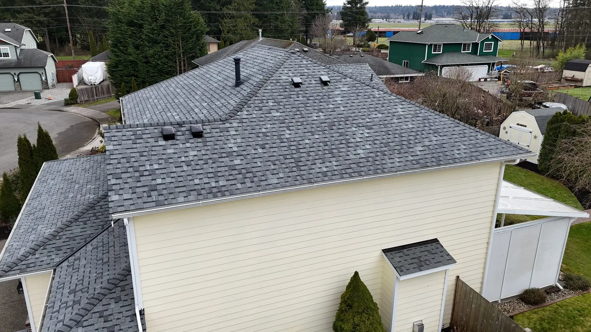 New architectural asphalt shingle roof on a two-story home in Arlington, Washington
