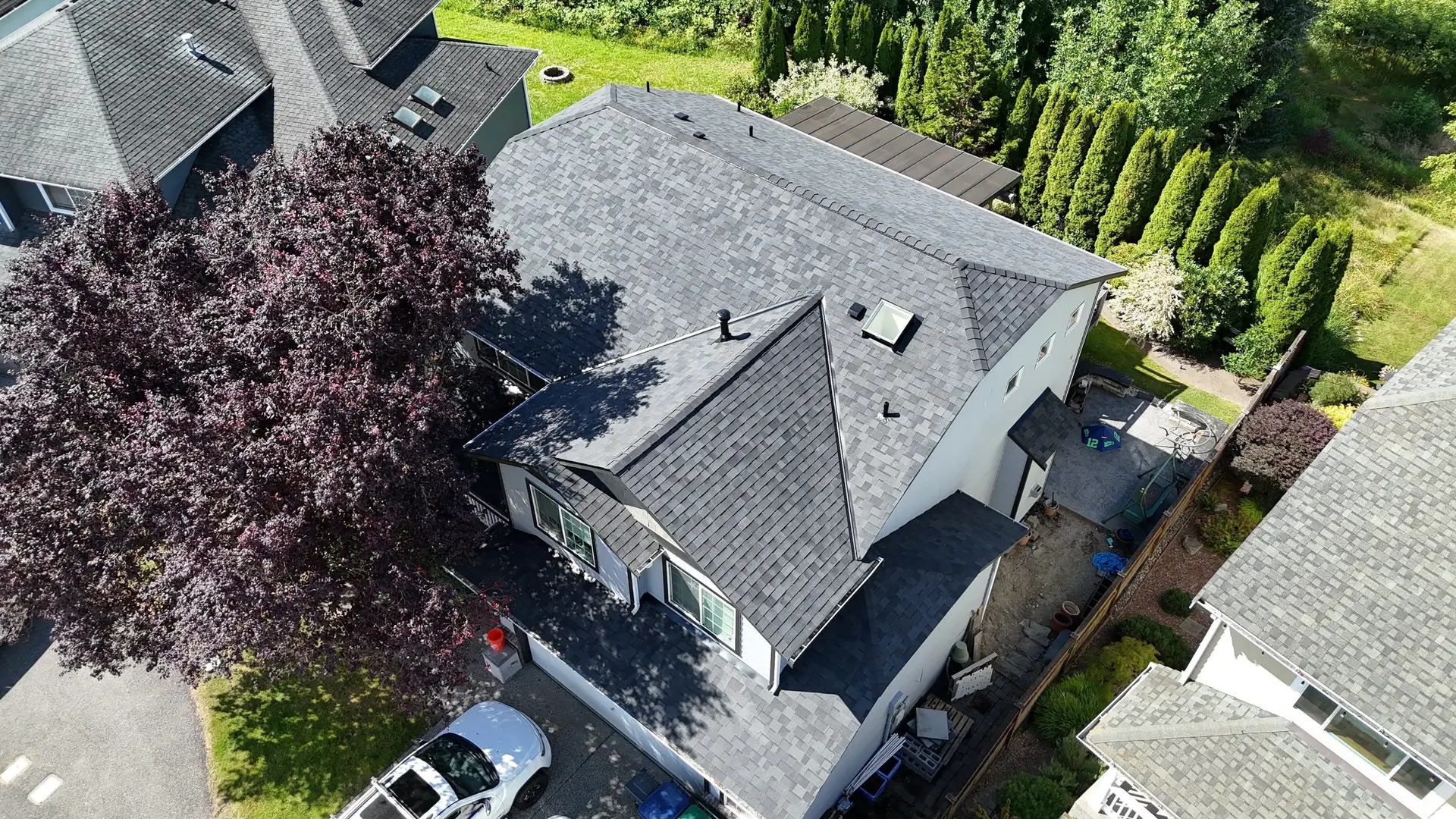 Aerial view of a new architectural shingle roof on a Marysville, Washington home