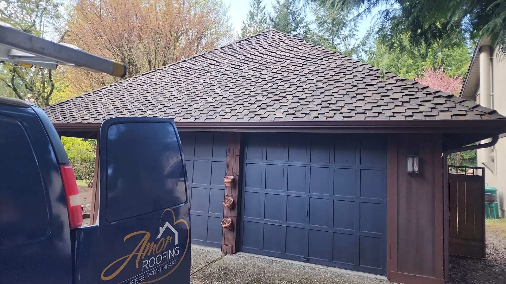 Amor Roofing van at a Mill Creek, Washington home with a new Presidential shake roof