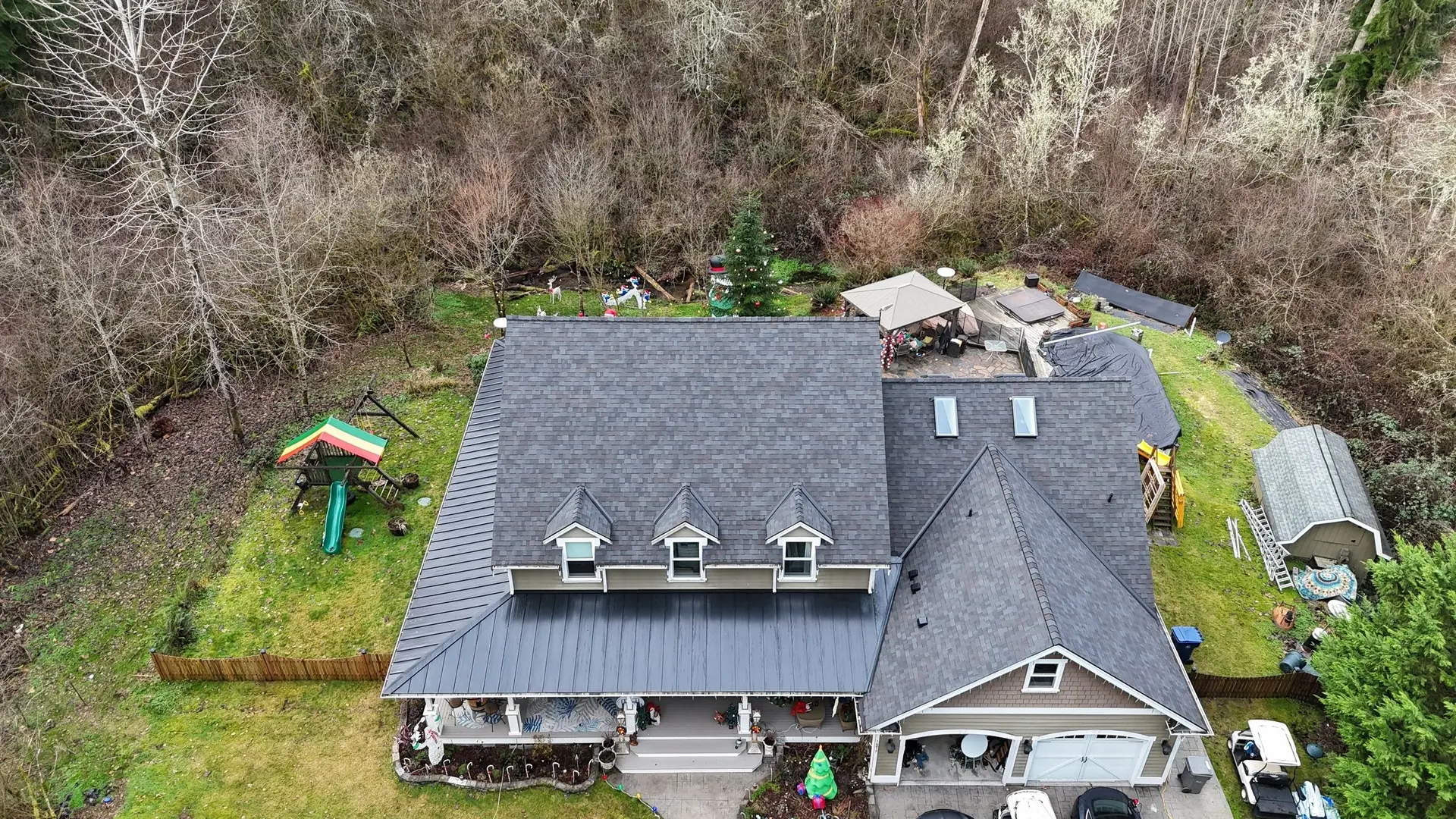 New charcoal architectural shingle roof on a craftsman home in Monroe, Washington